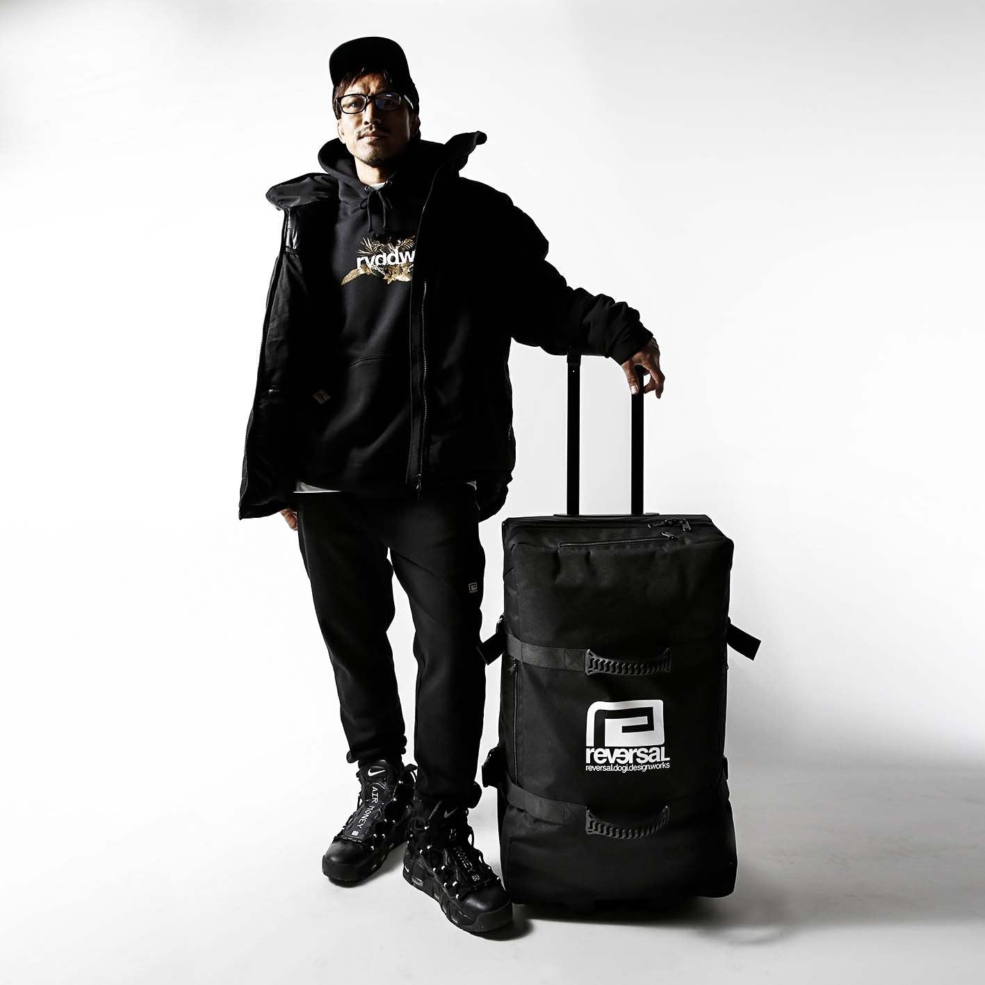 Black Wheeled Travel Case from Reversal Japan